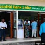 솔로몬 제도 환전 정보 - A bustling local bank branch in Honiara, Solomon Islands, with diverse customers patiently waiting i...